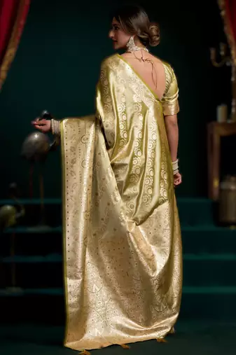 Light green premium satin silk blend saree with stylish pom-pom pallu