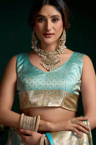 Sky blue premium satin silk blend saree with stylish pom-pom pallu