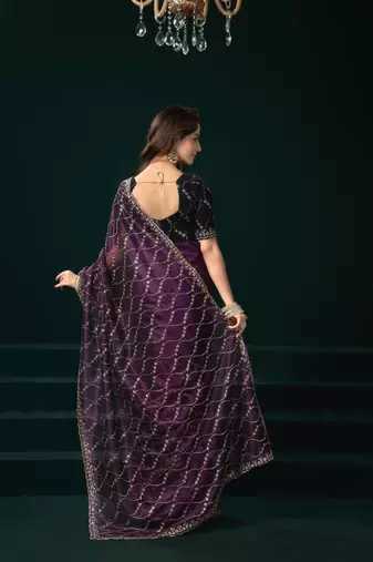 purple net saree with embroidered pallu work