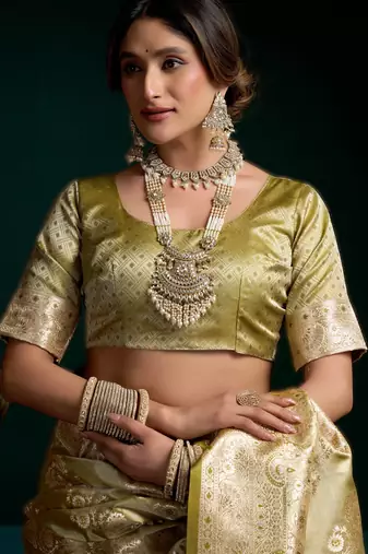 Light green premium satin silk blend saree with stylish pom-pom pallu
