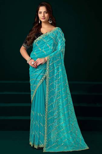 Turquoise net designer saree with sequins embroidery and velvet unstitched blouse