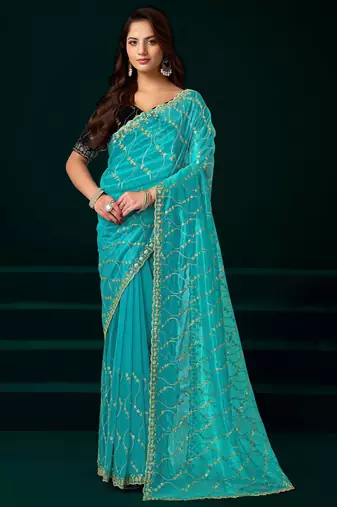 Turquoise net designer saree with sequins embroidery and velvet unstitched blouse
