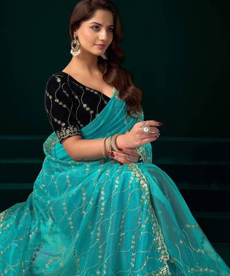 turquoise net designer saree with embroidered sequins work 4