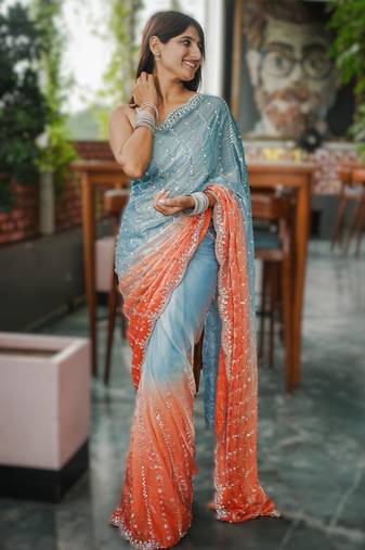 skyblue party wear saree with original gold beads work