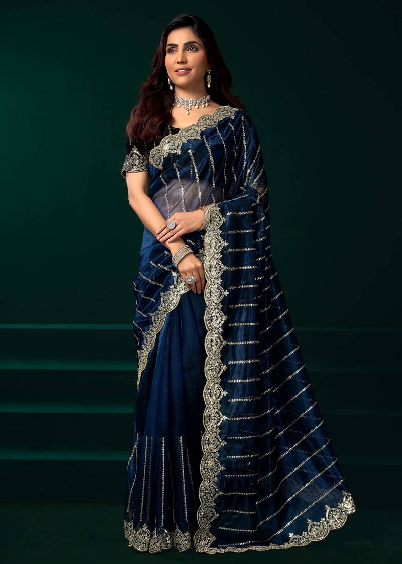 Blue sequins embroidered net designer party wear saree with unstitched velvet blouse