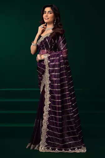 burgundy net saree with heavy floral embroidered designs