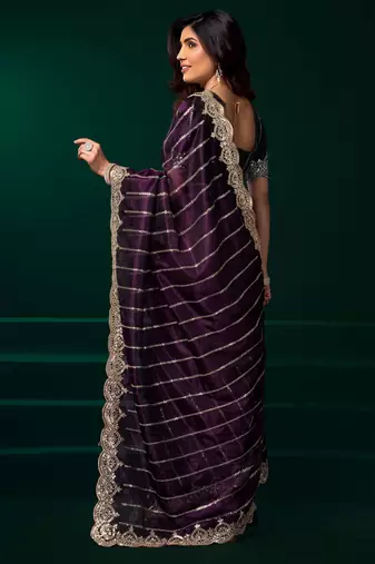 burgundy net saree with heavy floral embroidered designs