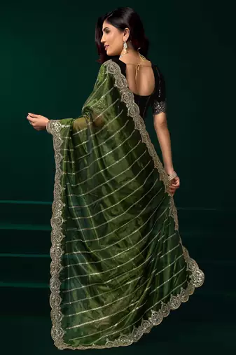 green net saree with heavy sequins embroidered designs