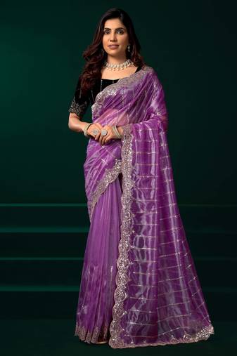 Lavender embroidered net wedding party saree with velvet designer blouse piece