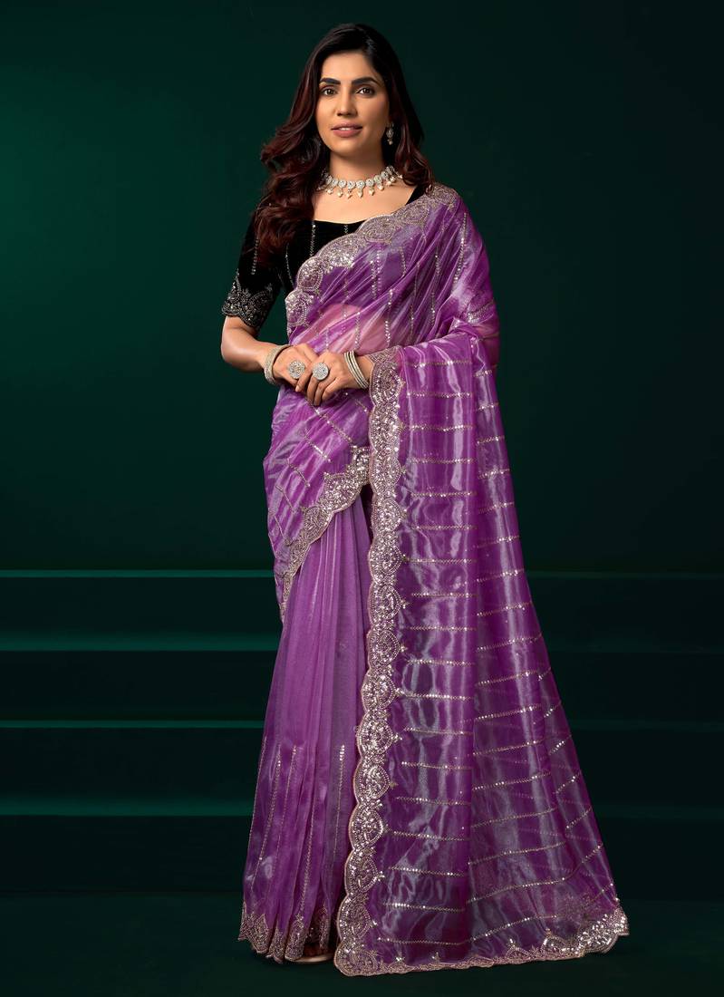 Lavender embroidered net wedding party saree with velvet designer blouse piece