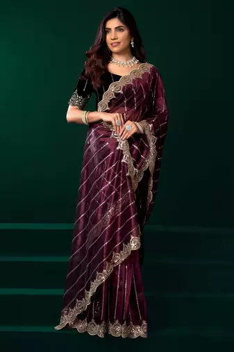 maroon net saree with heavy sequins embroidered designs