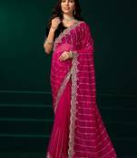 pink net saree with sequins embroidery and floral designs