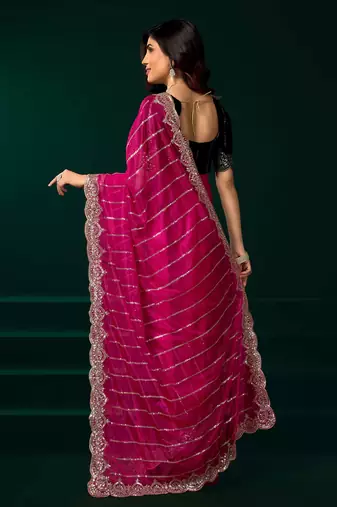 pink net saree with sequins embroidery and floral designs