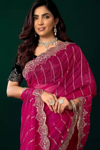 pink net saree with sequins embroidery and floral designs