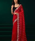 Red traditional net sequins work saree with unstitched velvet blouse
