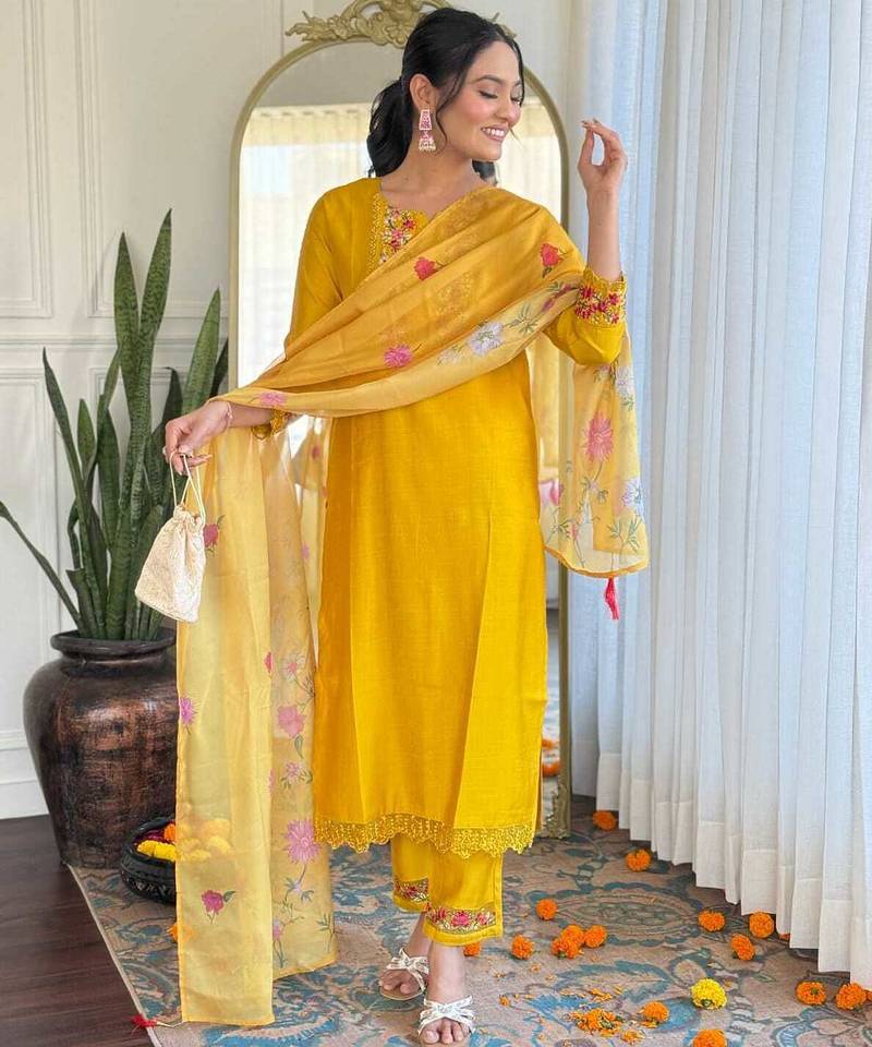 Yellow color gadhwal silk embroidered suit