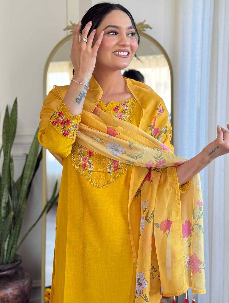 Yellow color gadhwal silk embroidered suit