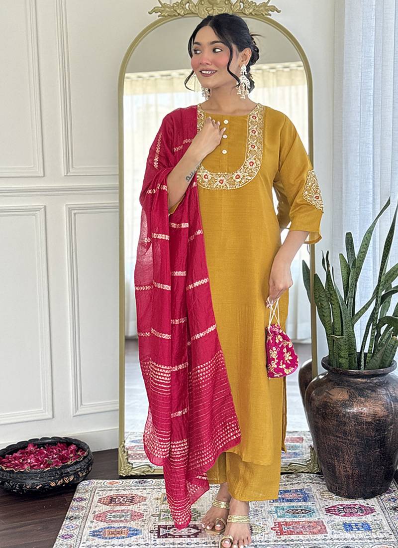 Yellow color vichitra silk embroidered straight suit