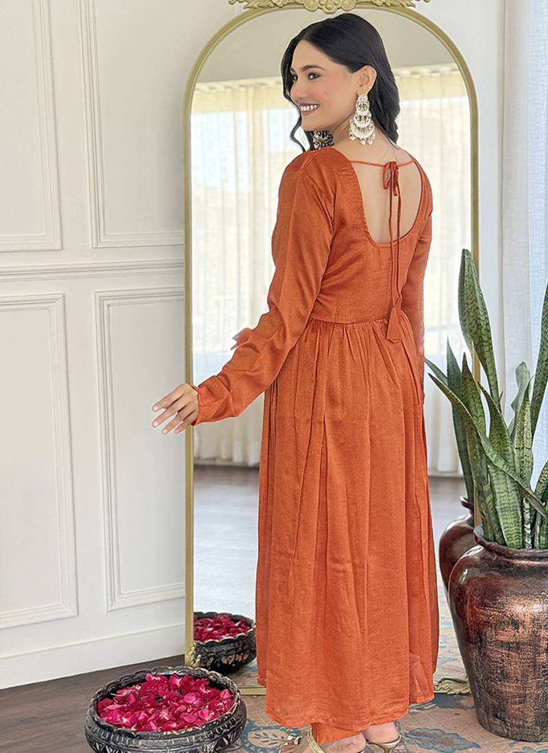 Orange color vichitra silk embroidered  anarkali suit