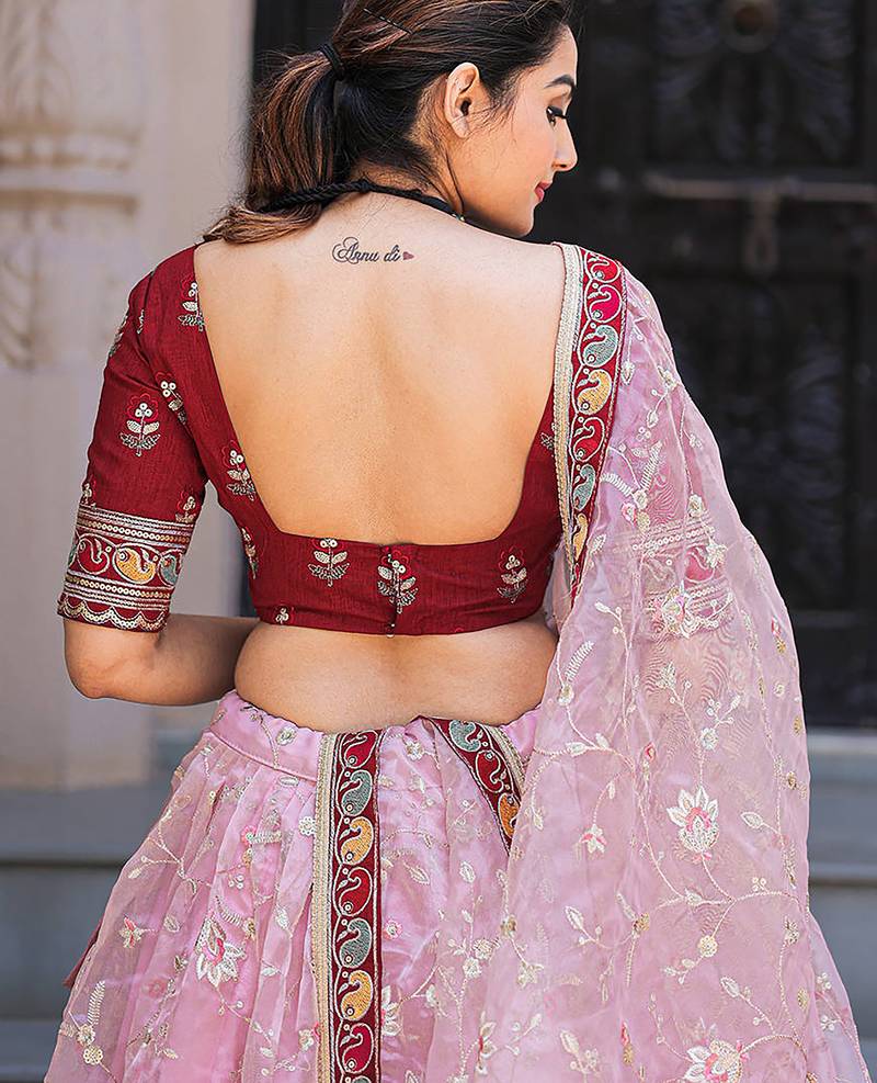 Fabulous Light Pink Thread Embroidery Organza Lehenga With Red Choli