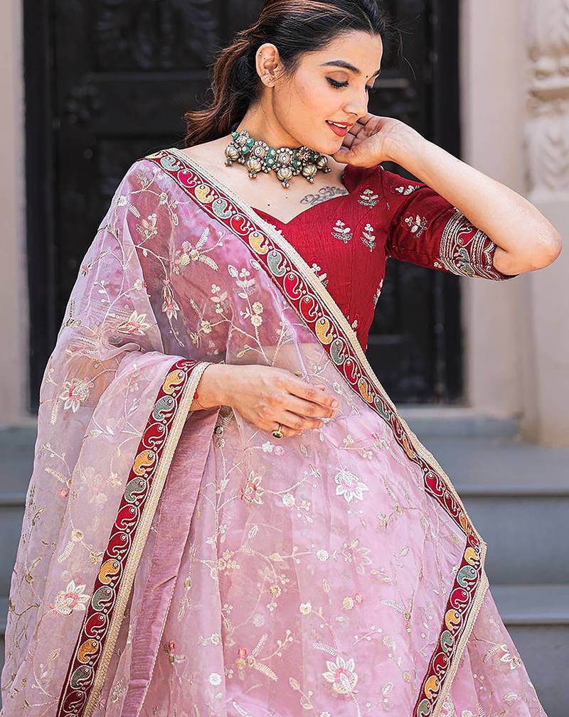Fabulous Light Pink Thread Embroidery Organza Lehenga With Red Choli