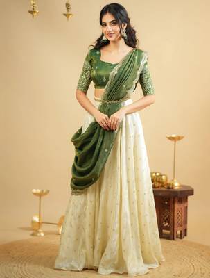 off white silk lehenga with green zari blouse 1