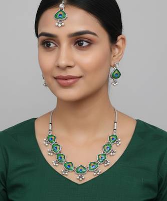 Brass silver plated peacock feather motif necklace set for women 1
