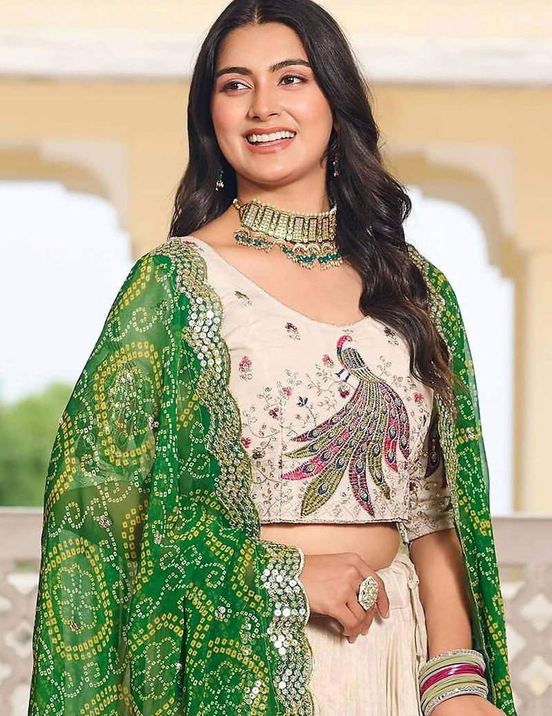 Sumptuous Off-White Sequins Tissue Silk Event Wear Lehenga Choli With Green Dupatta