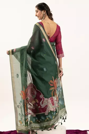Green premium muga cotton saree with rajwadi weaving lotus buttis & contrast blouse