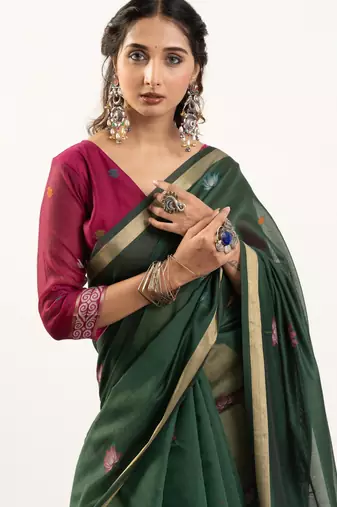Green premium muga cotton saree with rajwadi weaving lotus buttis & contrast blouse