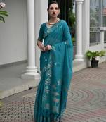 Blue premium jute linen silk saree with zari weaved pallu, double shaded border