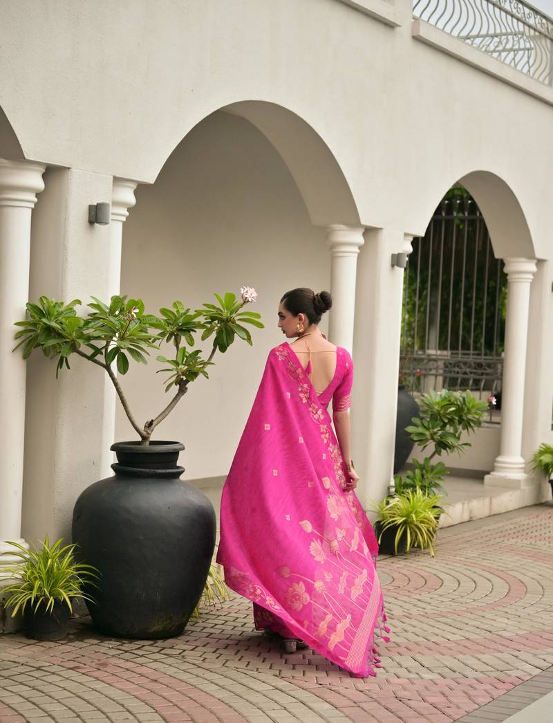 Pink premium jute linen silk saree with zari weaved pallu, double shaded border