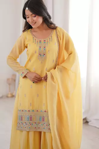 Yellow pure crunchy silk top kurta with sharara & dupatta