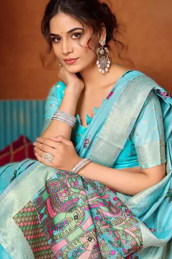 Blue khadi cotton saree with elegant jhallar border