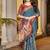 Teal blue handloom floral  saree with maroon border & tassel pallu