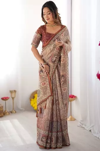 Beige handloom cotton saree with royal faces & elephant pallu motif