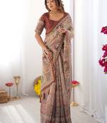 Beige handloom cotton saree with royal faces & elephant pallu motif