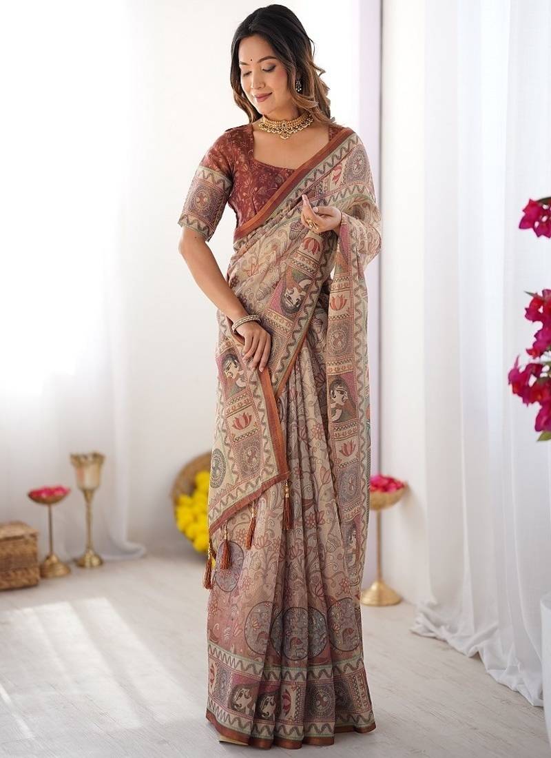 Beige handloom cotton saree with royal faces & elephant pallu motif