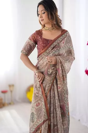 Beige handloom cotton saree with royal faces & elephant pallu motif