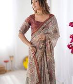 Beige handloom cotton saree with royal faces & elephant pallu motif