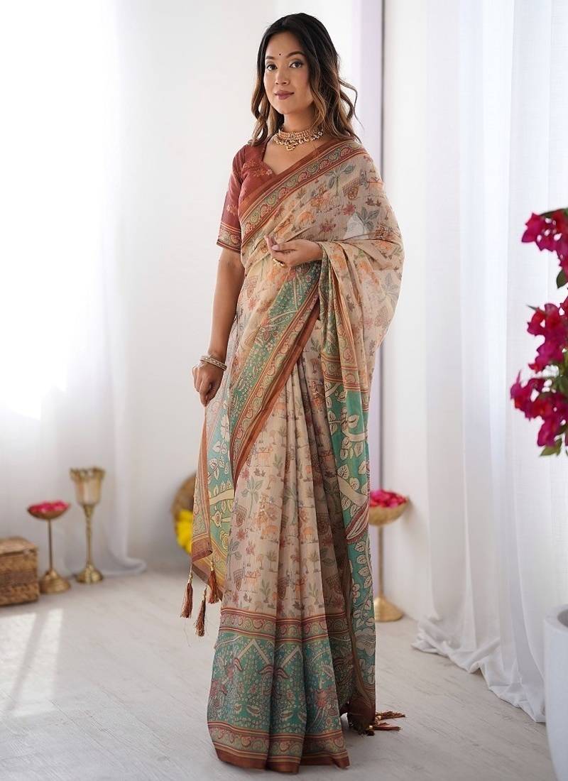 Beige handloom cotton saree with village life print and majestic peacock pallu