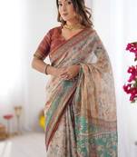 Beige handloom cotton saree with village life print and majestic peacock pallu