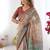 Beige handloom cotton saree with village life print and majestic peacock pallu