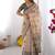 Beige handloom cotton saree with buti print, mandala motifs & peacock pallu
