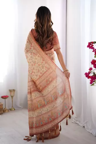 Ivory handloom cotton saree with maroon borders, floral print & royal procession pallu