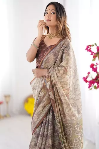 Beige & brown handloom cotton saree with mythical kalamkari pallu and elephant motifs