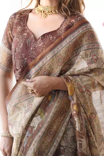 Beige & brown handloom cotton saree with mythical kalamkari pallu and elephant motifs