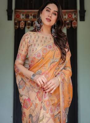 mustard orange with floral motifs linen cotton handloom printed saree, delicate borders, and tassels 1