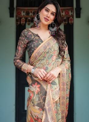 Olive green with bold floral motifs linen cotton handloom printed saree, vibrant peacock pallu, and tassels 1