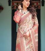 Cream with coral borders linen cotton handloom printed saree, peacock motifs, floral design, and tassels